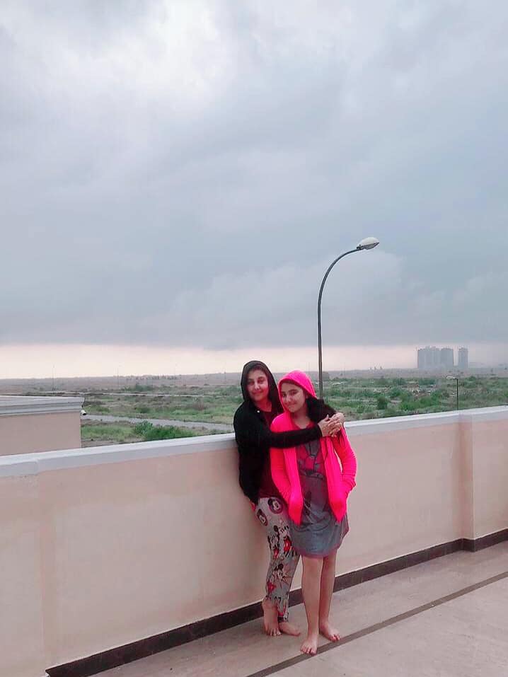 Javeria and Saud Enjoying Rain at their Home in Karachi