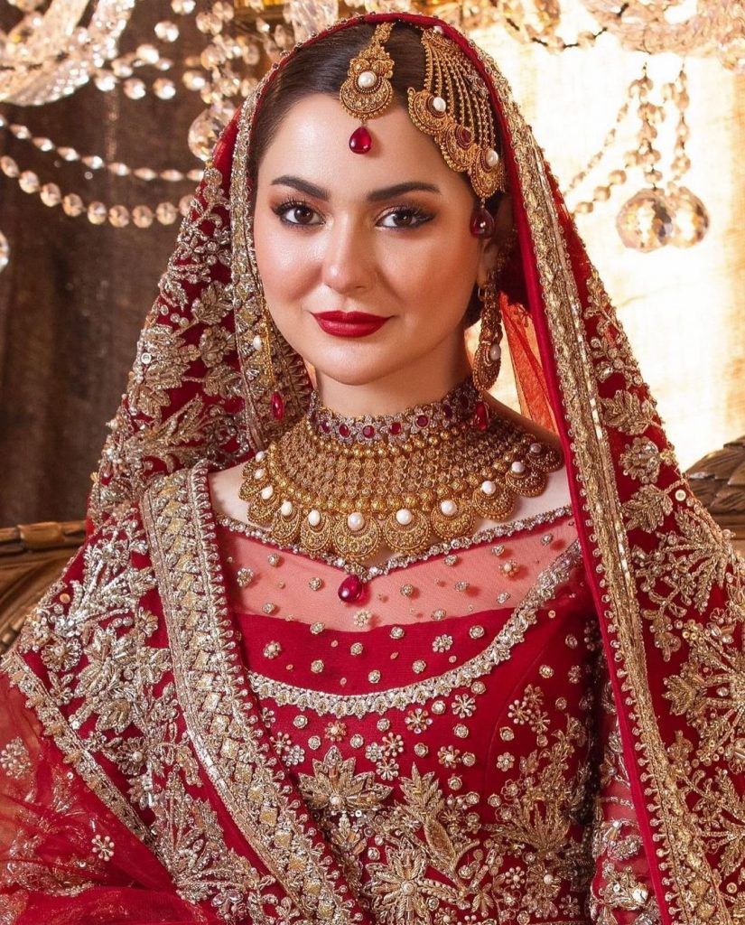 Hania Aamir Flaunts Elegance in Traditional Red Bridal attire