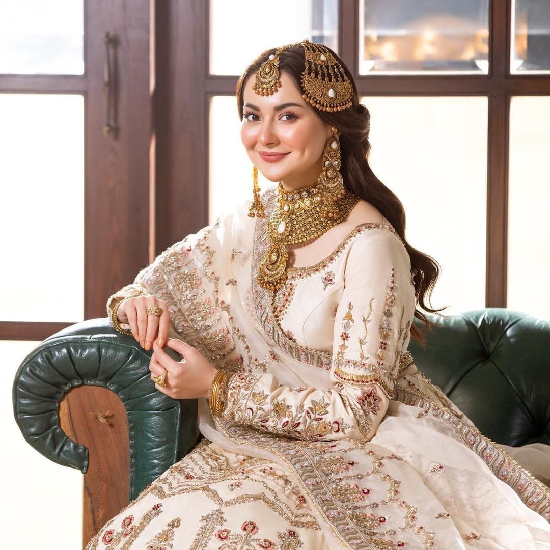 Hania Aamir Stunning Pictures in white Bridal dress