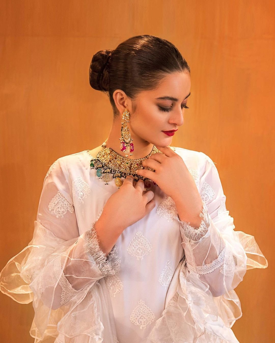 Aiman Khan channels her Glamour in White Attire