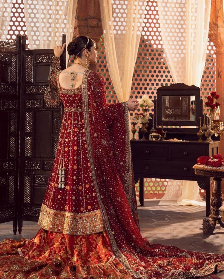Neelum Muneer Jaw Dropping Clicks wearing Crimson Bridal Attire